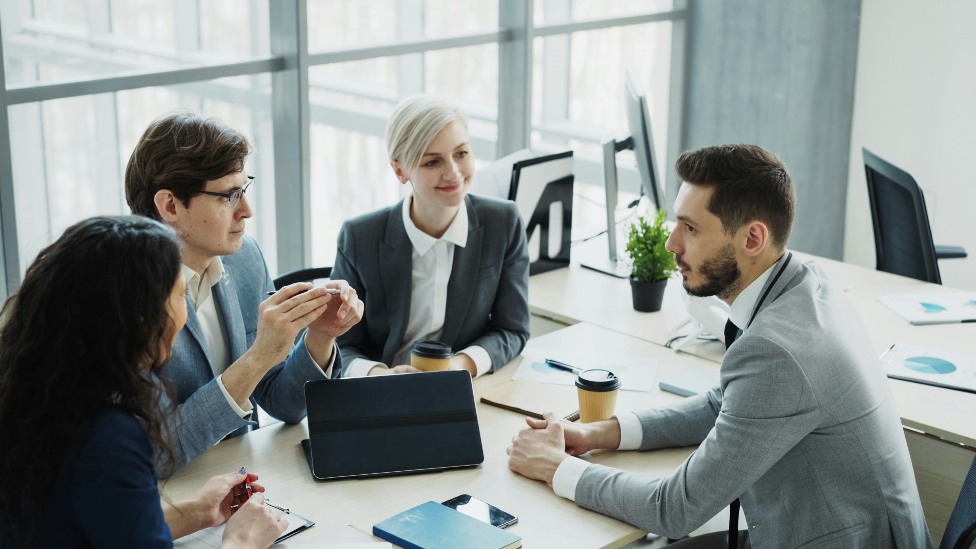 Diverse business team collaborating in a modern office.
